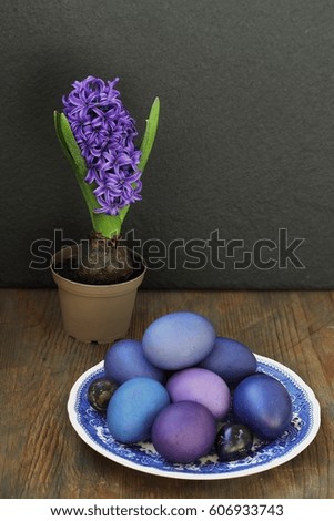 Happy Easter. Easter eggs of blue and purple hue. Space for text
