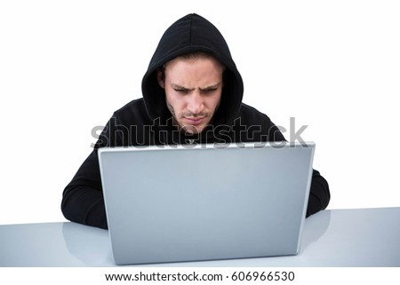 Handsome man in black hoodie using laptop on white background