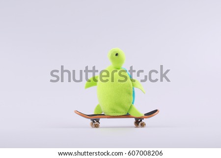 animal toys on fingerboard
