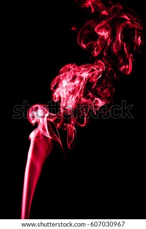 Red smoke isolated on black