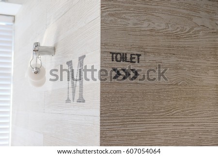 Wooden Toilet sign and symbol direction to men toilet