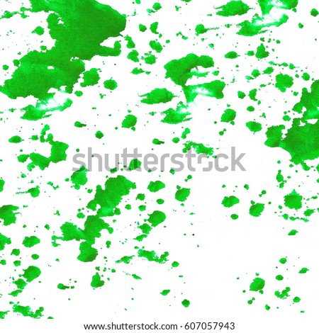 Stains of green paint on a white background