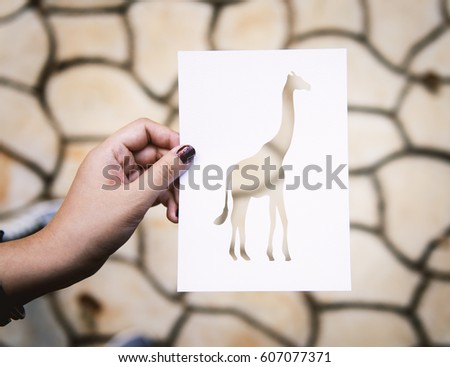 Hand Hold Giraffe Paper Carving