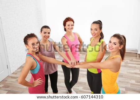 Beautiful girls ready for training in gym