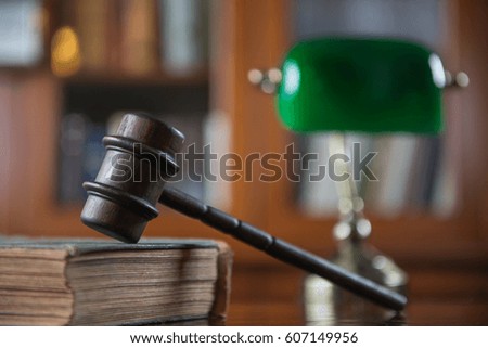 Law Concept. Judges Gavel And Scale Of Justice. wooden desk, books