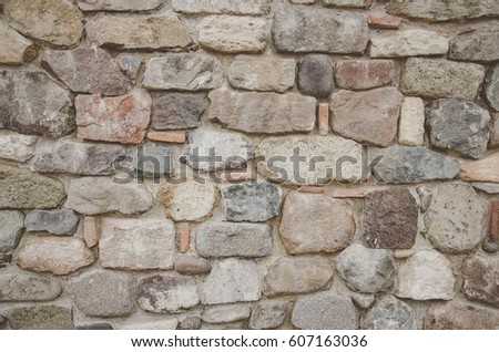 stone wall abstract background with brutal stones