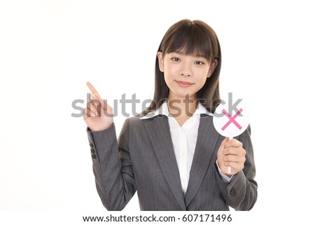 Businesswoman with a No sign