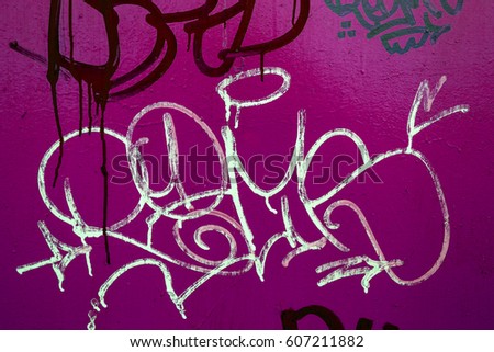 Beautiful street art of graffiti. Abstract color creative drawing fashion on walls of city. Urban contemporary culture. Title paint on walls. Culture youth protest. ABSTRACT PICTURE. Tag painting