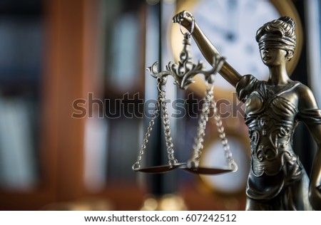 Law and Justice concept with gavel and scale in background. Composition in court library Royalty-Free Stock Photo #607242512