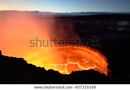 inside view of an active volcano with lava flow in Volcano National Park, Big Island of Hawaii, USA Royalty-Free Stock Photo #607316168