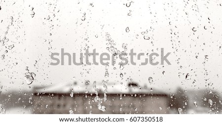 Water drops on the glass after rain