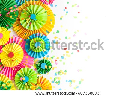 Colorful bright paper rosette. Decorating for a party.