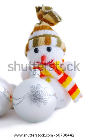 Christmas snowman isolated on a white background with christmas balls and snowflake