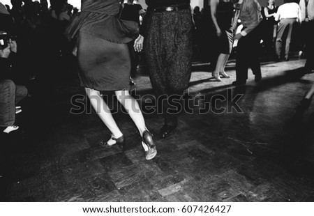 swing dancers in black and white and vintage style