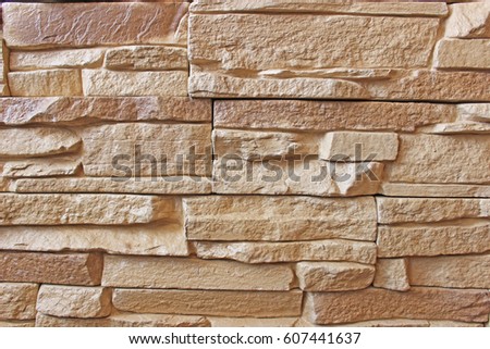 Texture wall artificial stone close-up. Background of material