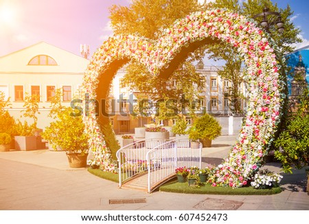 Photo spot with flower decoration and bridge on Pyatnitskaya street near Novokuznetskaya metro station in Moscow, Russia