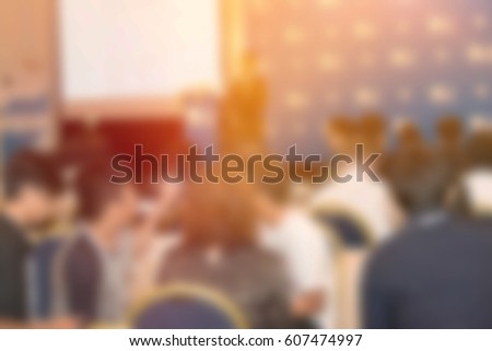 blur background of meeting and exhibition room hall with business people