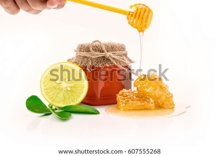 honey and lemon on white background, alternative medicine