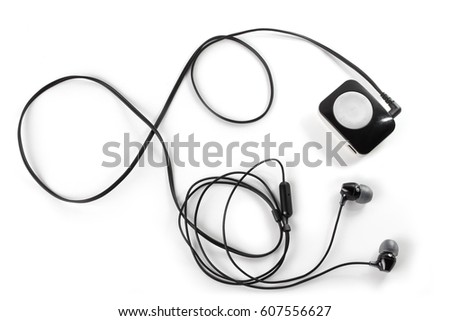 Mp3 player and headphones, isolated on white Royalty-Free Stock Photo #607556627