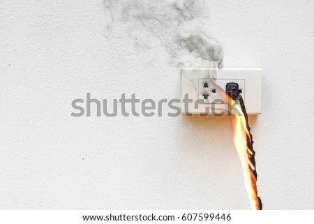 Electricity short circuit / Electrical failure resulting in electricity wire burnt Royalty-Free Stock Photo #607599446