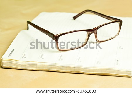 Glasses and calendar in color
