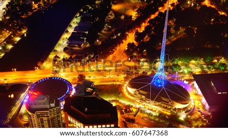 The long shutter speed at night of bird eye view monument in Melbourne city Royalty-Free Stock Photo #607647368