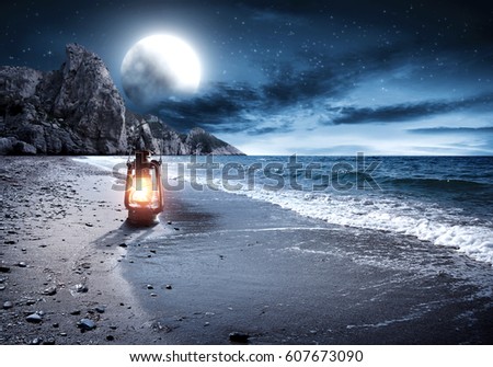 lamp on beach and summer night 