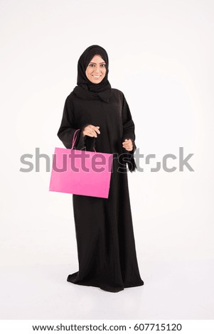 Arab woman shopping on white background