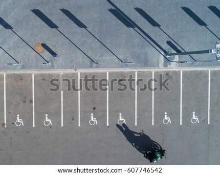 Aerial view of disabled handicap parking lot reserved for hadicapped.
