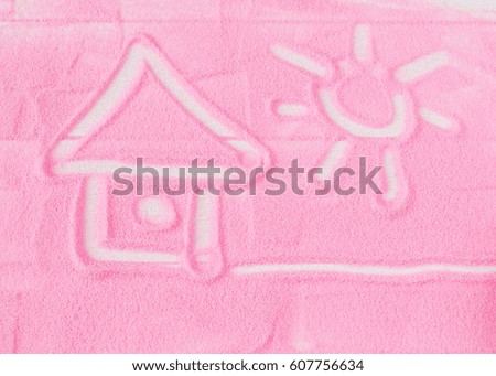 House and sun on the background of decorative sand. A child's drawing on the theme of a happy life.