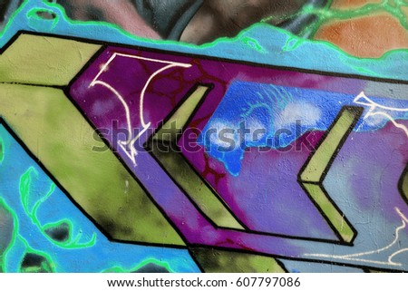 Art under ground. Beautiful street art graffiti style. The wall is decorated with abstract drawings house paint Modern iconic urban culture of street youth. Abstract stylish picture on wall street tag