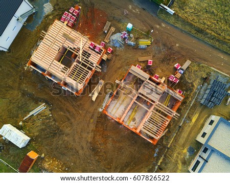 Aerial view of construction site new houses. Construction industry from above.