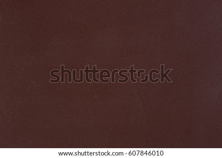 Close up of a red leather texture. High resolution photo.