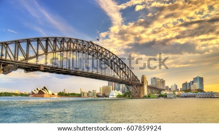 Sydney Harbour Bridge seen from Milsons point, Australia. Royalty-Free Stock Photo #607859924