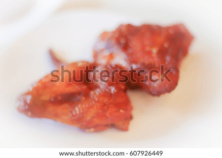 Picture blurred abstract background of grilled chicken