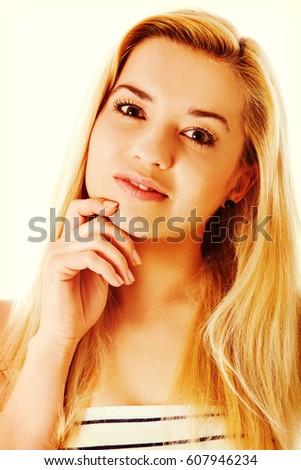 Portrait of thinking woman. Isolated on white background.