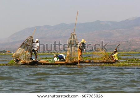 The famous fishermen of Inle Lake, Myanmar, working at sunrise