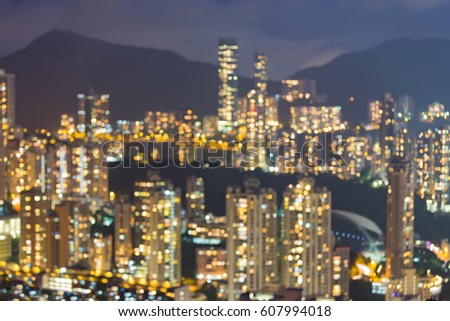 City apartment blurred bokeh light night view, Hong Kong city downtown, abstract background