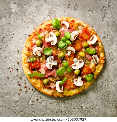 Fresh italian pizza with mushrooms, ham, tomatoes, cheese, olive, basil on grey concrete background. Copy space. Homemade with love. Fast delivery. Recipe and menu. Banner.