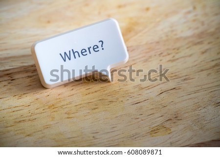 Word “where” white button on wood texture background with space for add text, copy space and template. can be use to template for meeting and powerpoint presentation