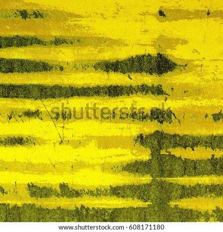 Texture of old yellow paint on the worn surface
