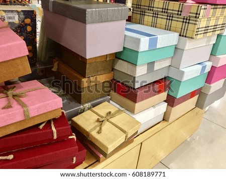 Stack of gift boxes in various color and sizes