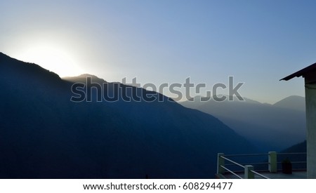 Mountain sunburst dramatic sunrise over Himalaya 