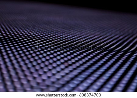 Selective focus of White dots texture on large monitor
