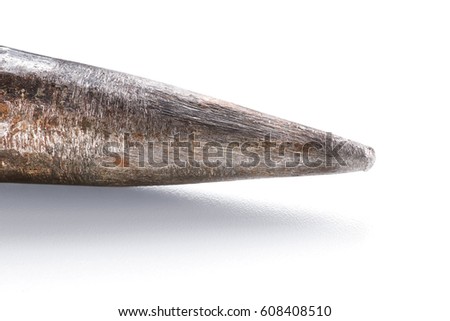 Used iron spike point close up. On white, clipping path included