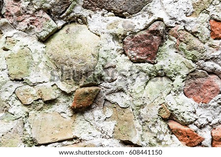 stone wall with real pattern gray color of modern style design decorative uneven cracked surface cement