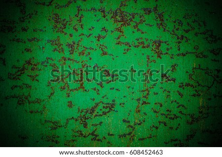Dark green worn rusty metal texture background.
