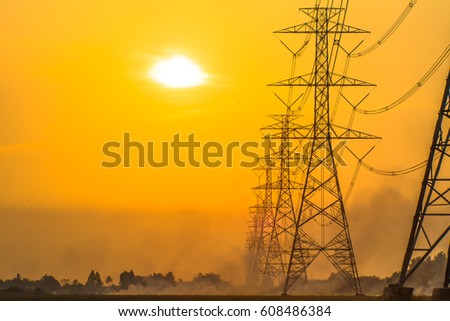 Height voltage pole in the sunset background