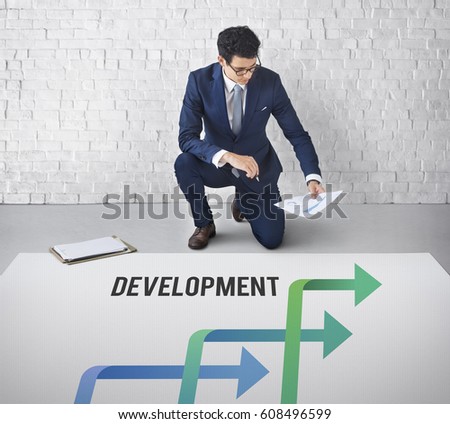 Businessman Working on the Room Thinking about Business Plan