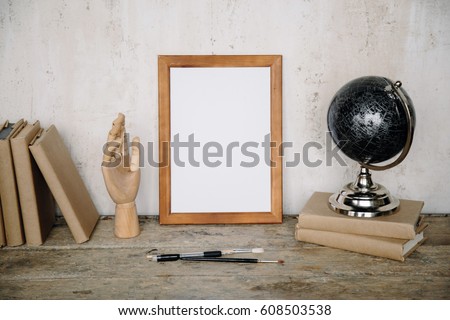 Frame mock up with accessories for study. Hipster background. Creative education concept